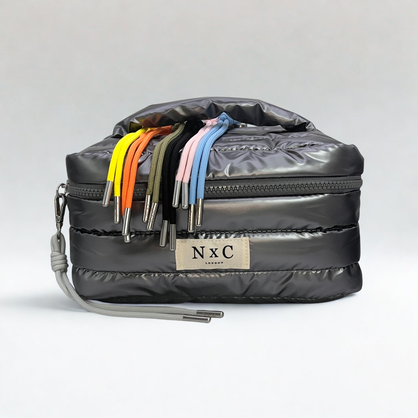 The NxC Puffer Travel Set in Graphite