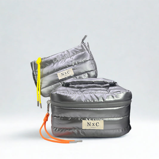 The NxC Puffer Travel Set in Graphite
