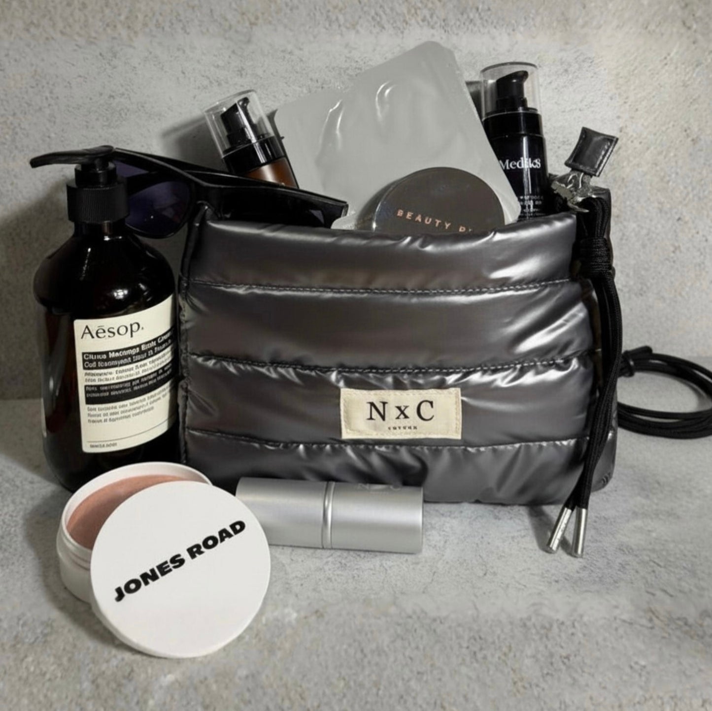 The NxC Puffer Travel Pouch in Graphite