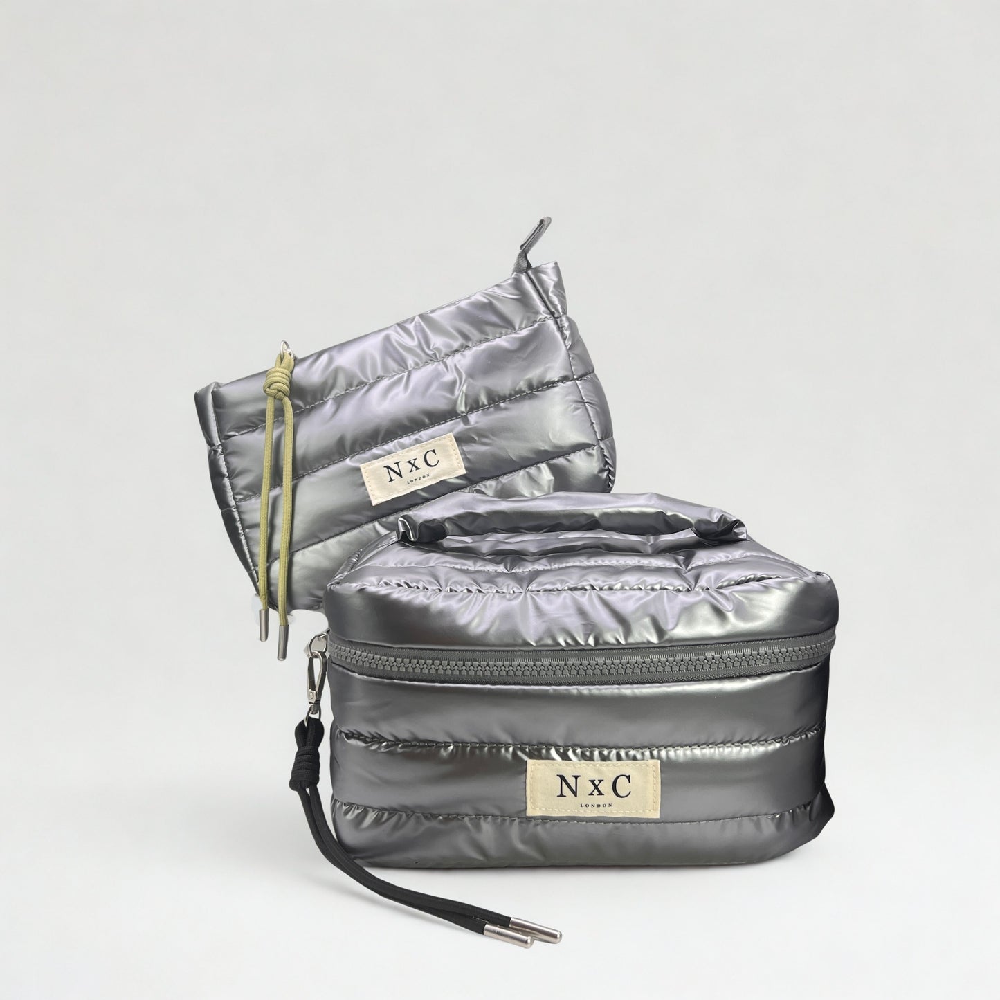 The NxC Puffer Travel Set in Graphite