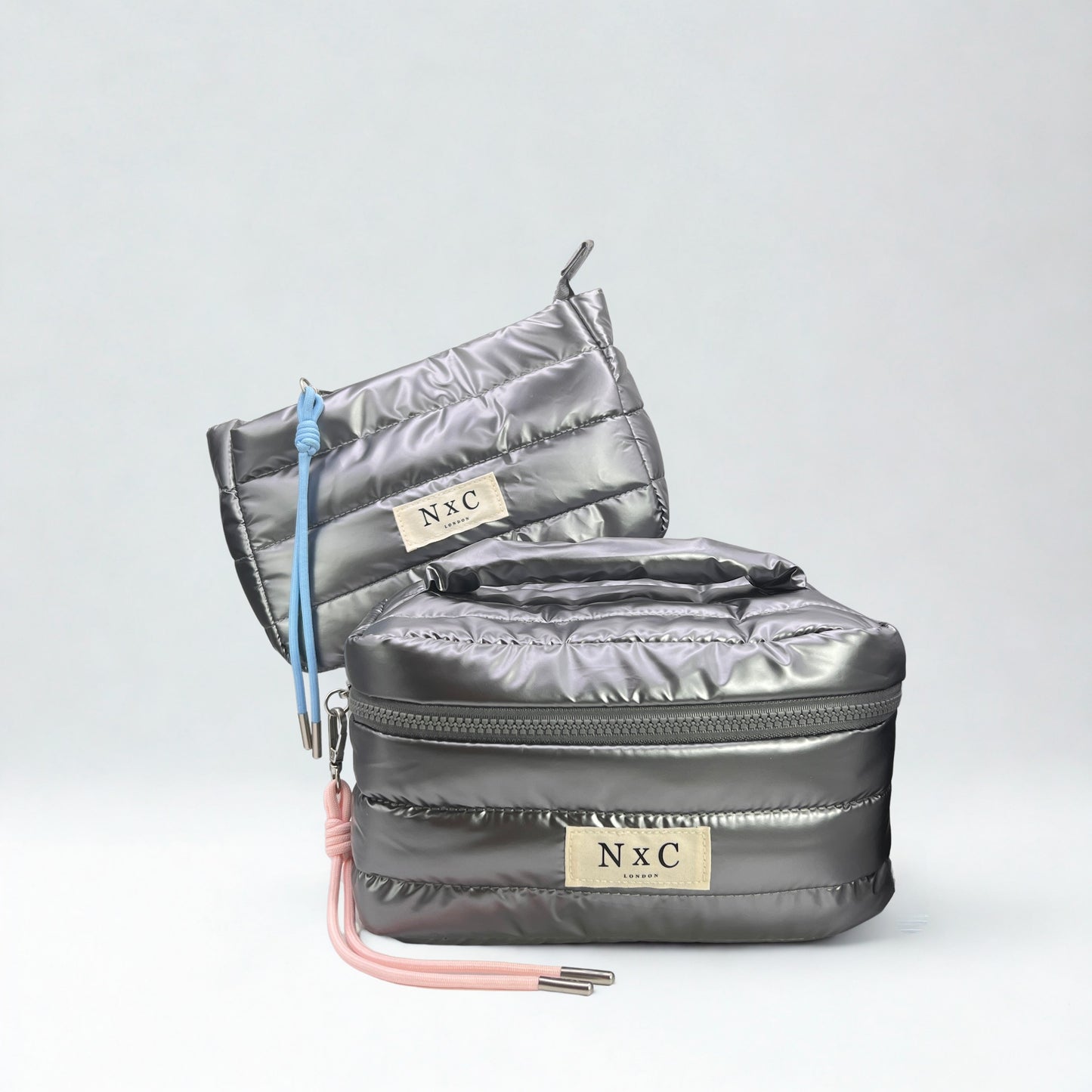 The NxC Puffer Travel Set in Graphite