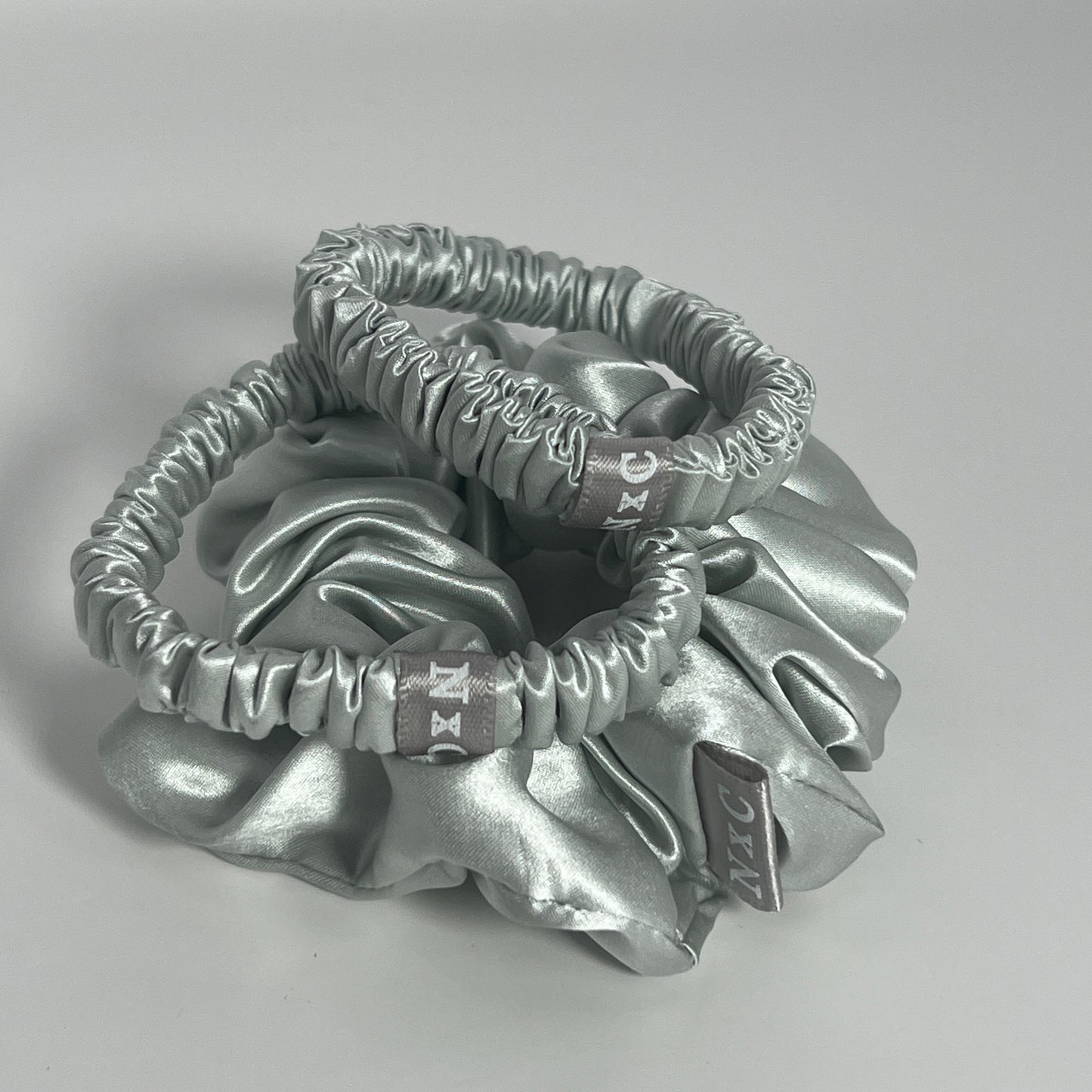 The NxC Silk Scrunchie Trio in Silver